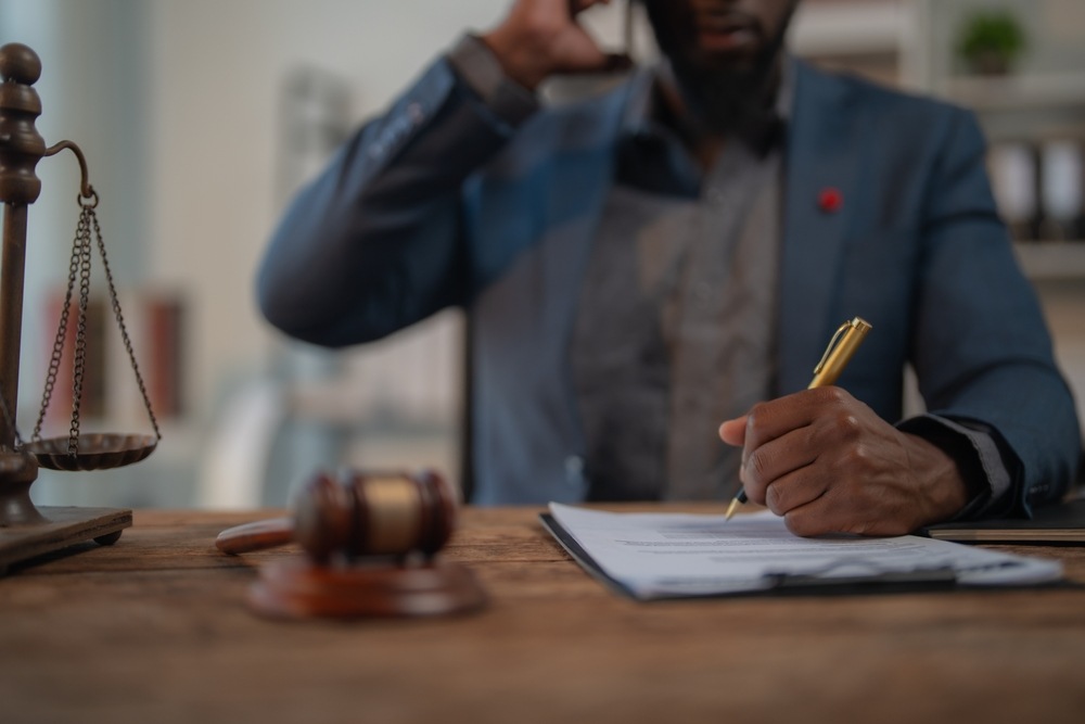 New Jersey personal injury attorney discussing case costs during a client consultation call